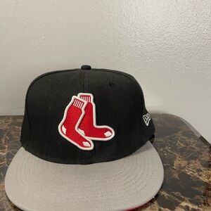 Black and Gray Cap with Red Socks Logo